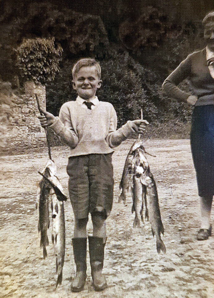 Figure 2: The author aged 10 with a large haul of Pike caught on Lough Rynn,
with his mother in the background